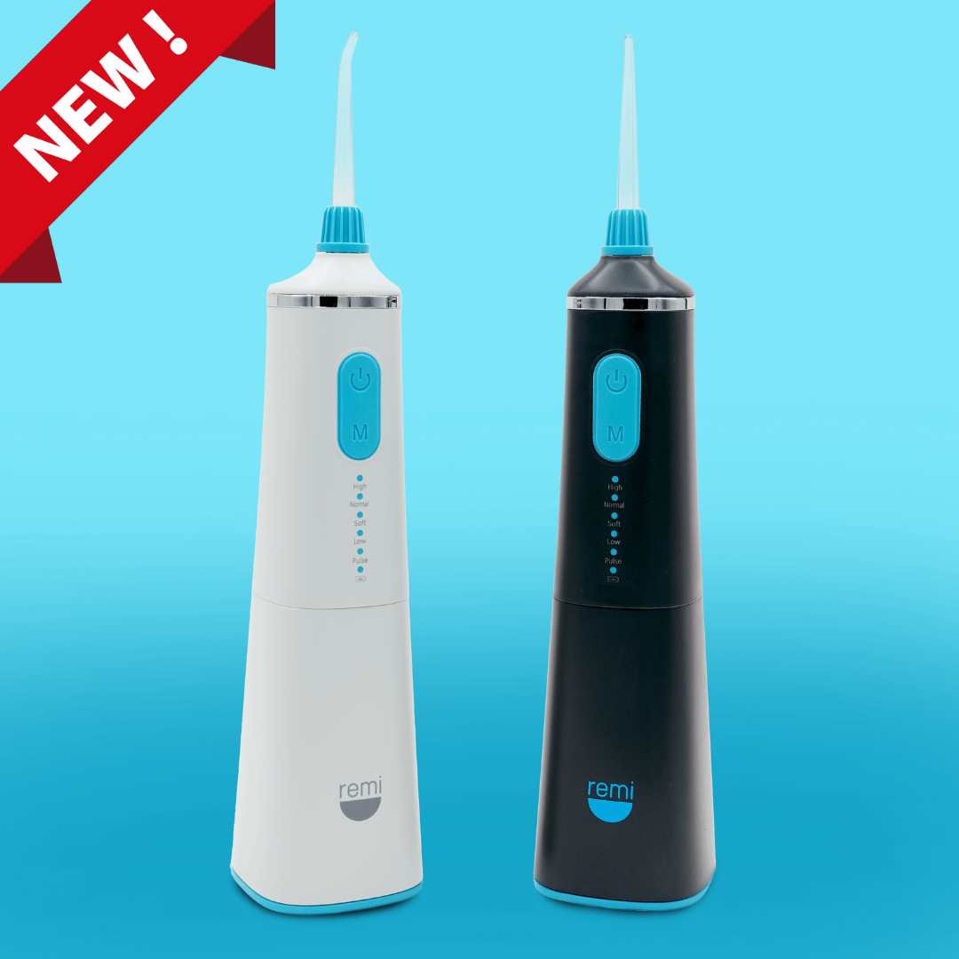 Two new remi brand Cordless Water Flossers, one white and one black, against a blue background.