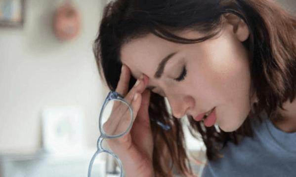 Why you Need a Night Guard for TMJ Dysfunction | Woman with Headache