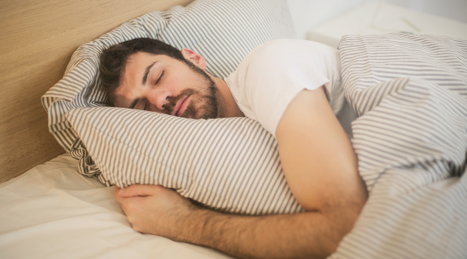 The Symptoms & Side Effects of Biting Your Tongue During Sleep
