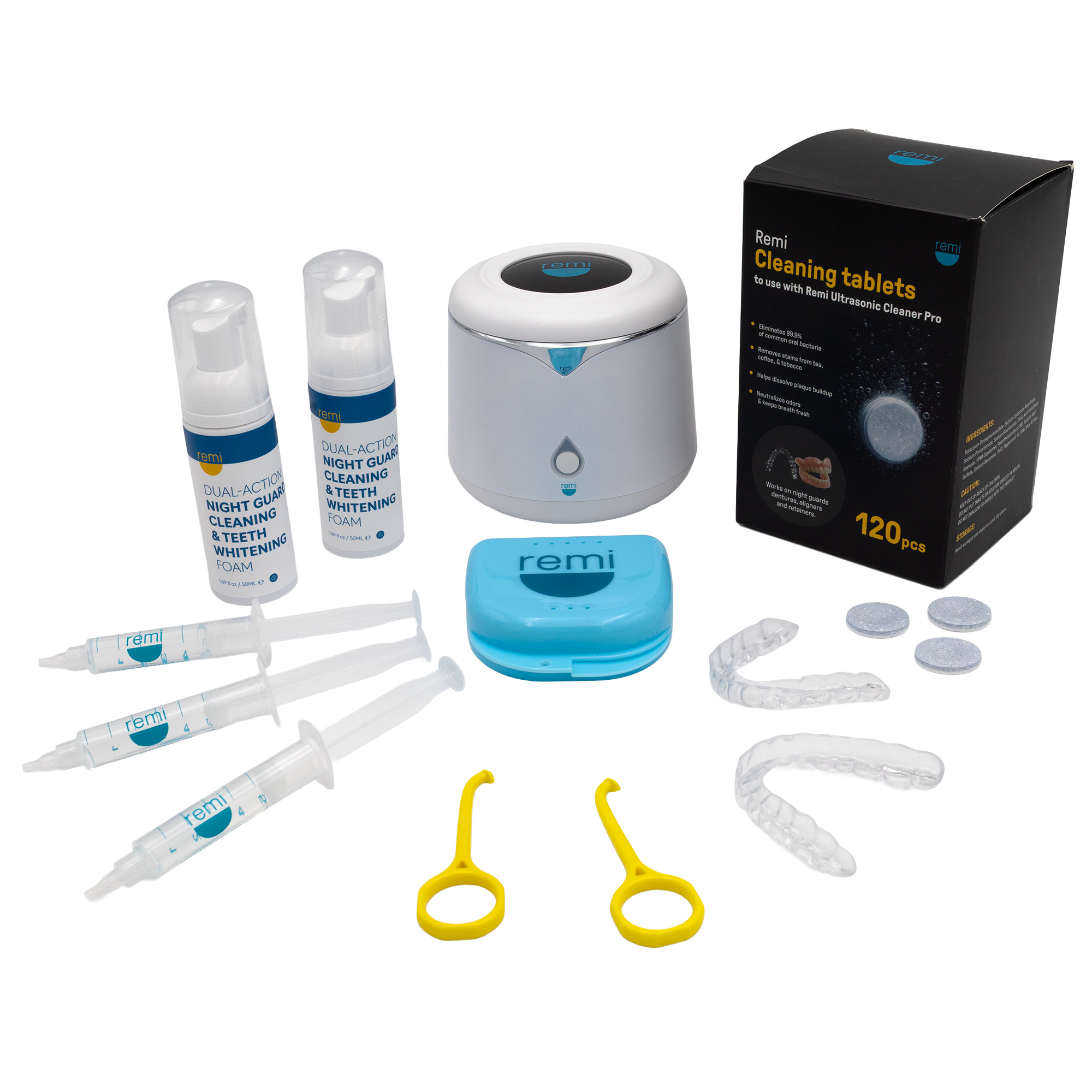 A teeth whitening kit with whitening gel syringes, teeth whitening foams, clear dental trays, a blue case, yellow dental tools, cleaning tablets, and an ultrasonic cleaner, all arranged next to a sleek black product box.