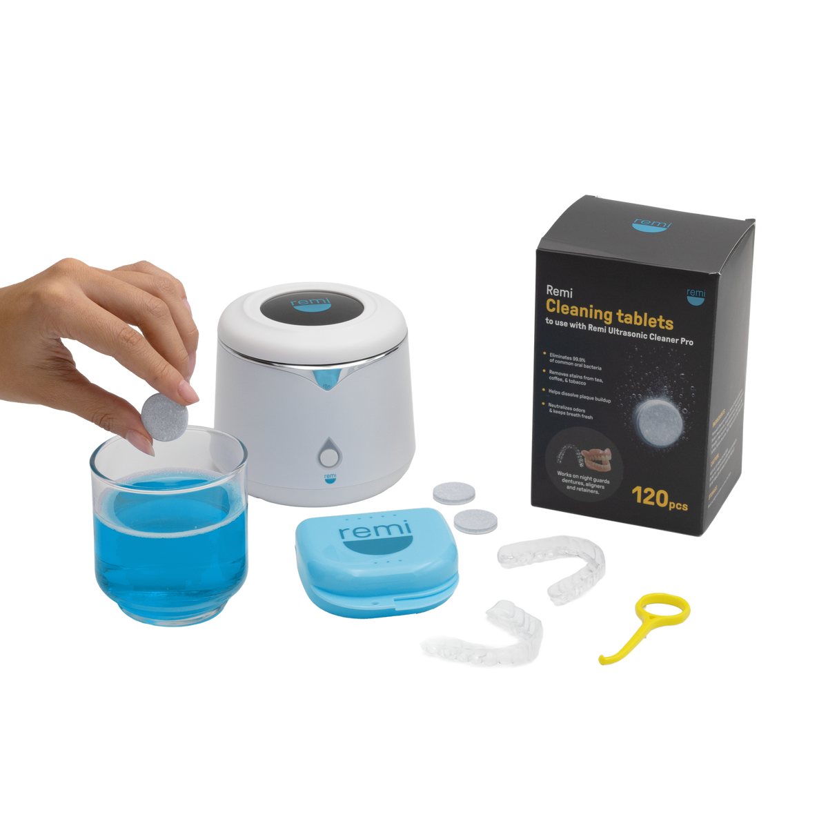 Placing a night guard into the ultrasonic cleaner from the Remi Essentials Bundle