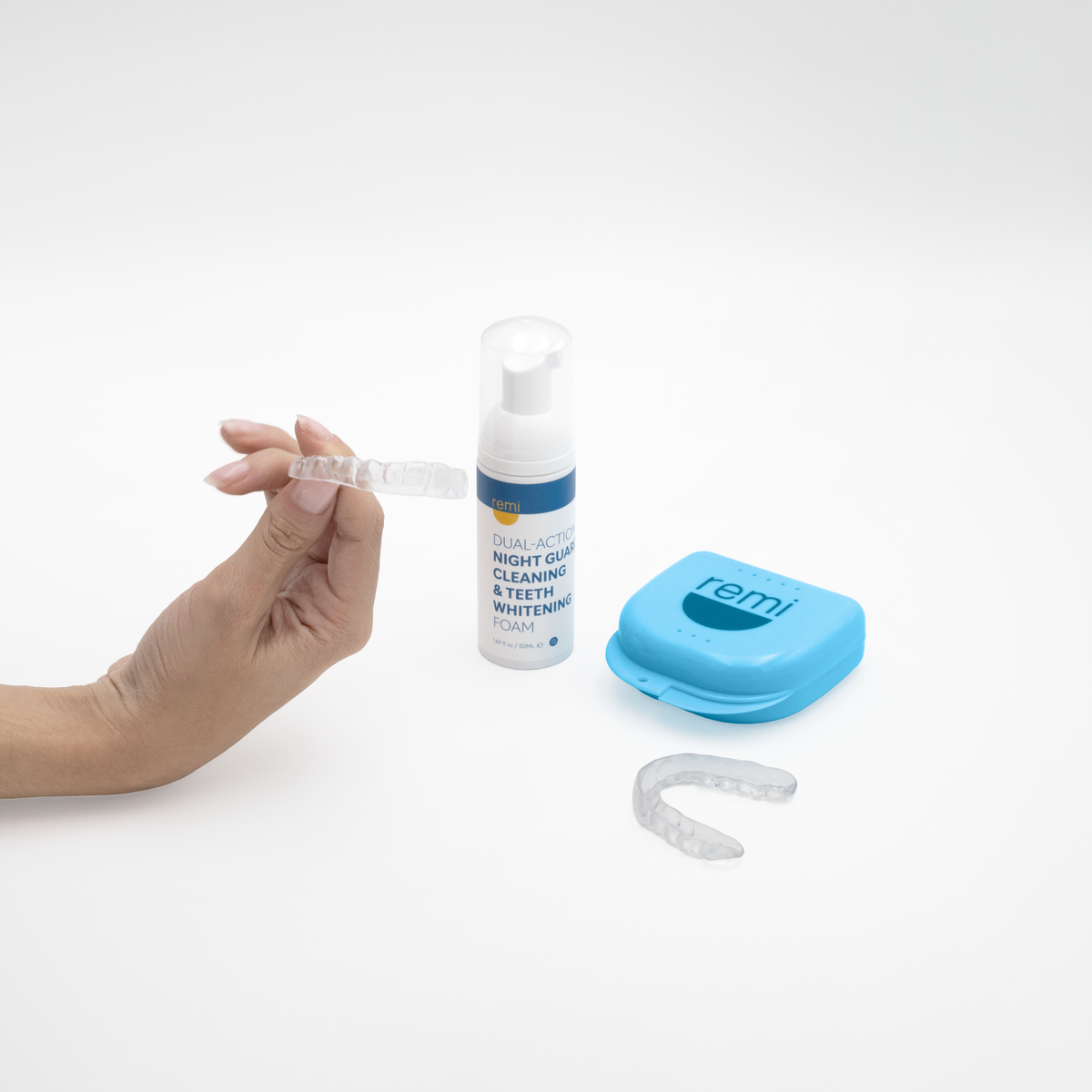 Remi Starter Bundle items: whitening foam, night guard, and carrying case