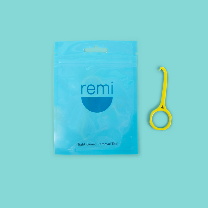 Blue packaging labeled "remi" sits beside a yellow Mouth Guard & Retainer Removal Tool on a teal background, combining functionality and style.