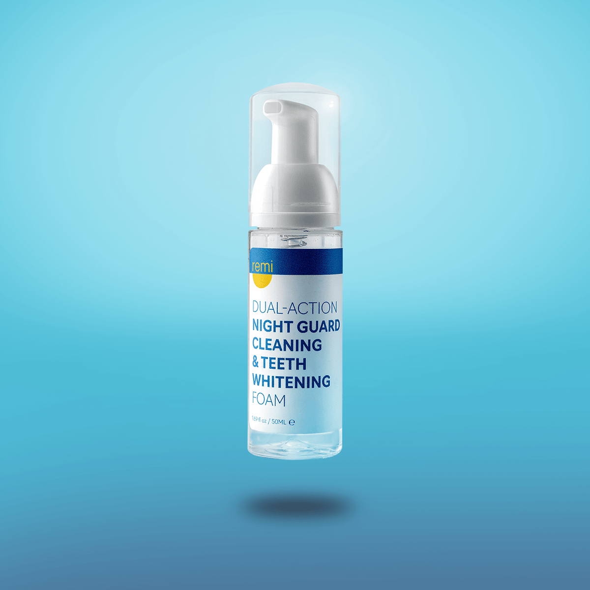 A bottle of Night Guard Cleaning + Teeth Whitening Foam on a blue background.